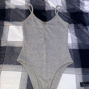 grey body suit